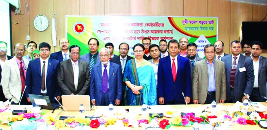 Masum Kamal Bhuiyan, Executive Director of Bangladesh Bank poses with the participants in a 'workshop on Payroll Tax and online return submission' at NBR head office in the city recently. Ahmad Ali, G M Abul Kalam Azad, General Managers and Deputy Gener