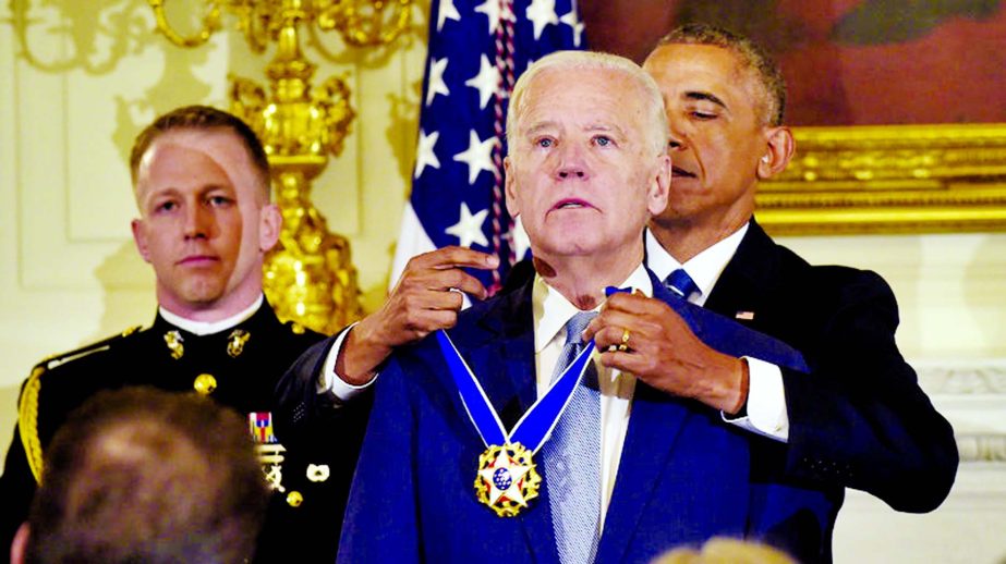 President Obama presents a teary-eyed Vice President Biden with the Presidential Medal of Freedom at the White House on Thursday.