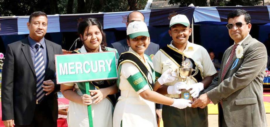 Air Officer Commanding of BAF Base Bashaar Air Vice Marshal M Abul Bashar awarding champion trophy to Mercury House of BAF SEMS annual sports on Saturday.