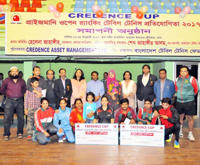Prize winners of Credence Cup Prize money Open Ranking Table Tennis tournament pose for photo with the guests and officials at Shaheed Tajuddin Ahmed Indoor Stadium in the city on Saturday.