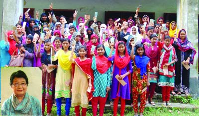 JHENAIDAH: The 45 girl students of Kaliganj village showing their educational stipend received from a Japanese woman photographer Heroko Kubayshi recently(inset Kubayshi).