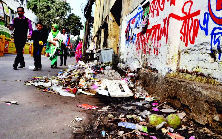 Garbage being dumped on the road behind the Ministry of Foreign Affairs in the city's Segunbagicha. But the authority concerned seemed to be indifferent to remove the garbage from the spot. The snap was taken on Sunday.