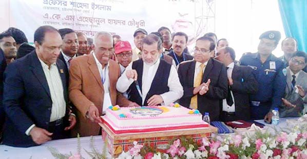 Chairman of the Parliamentary Standing Committee, Ministry of Railway Fazle Karim Chowdhury MP cutting cake in the reunion function of Gorchi High School Ex-Students Association at school premises as Chief Guest on Saturday.