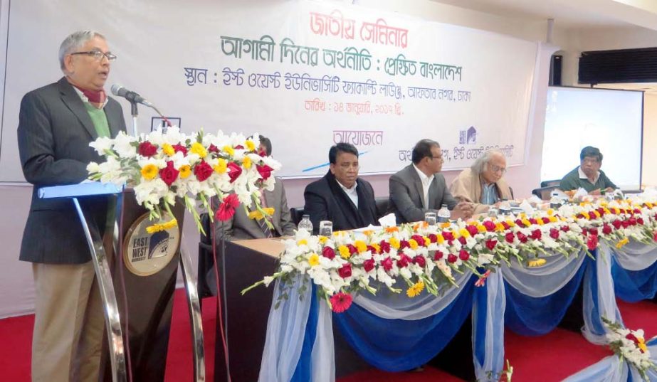 Dr Mohammed Farashuddin, Chairperson, Board of Trustees, East West University speaks at a seminar on "Tomorrow's Economy: Bangladesh Perspective" held on Saturday at East West University at Aftabnagar in the capital.