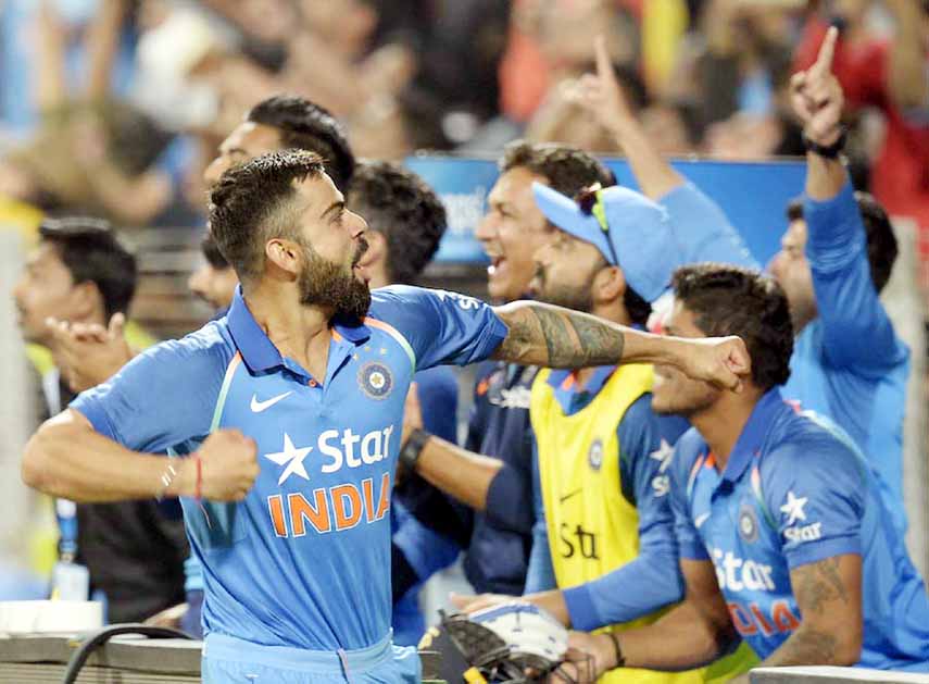 India's captain Virat Kohli celebrates after India won the first One-Day International cricket match against England at the MCA International Cricket Stadium in Pune on Monday.