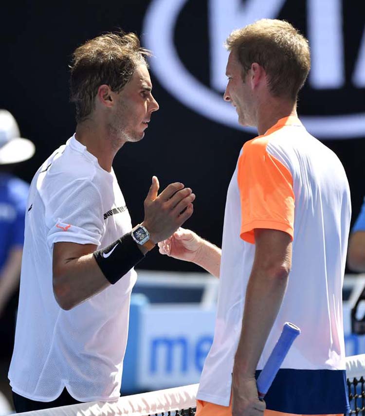 Spain's Rafael Nadal (left) is congratulated by Germany's Florian Mayer after their first round match at the Australian Open tennis championships in Melbourne, Australia on Tuesday.