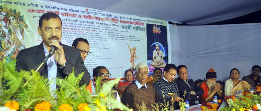 CCC Mayor AJM Nasir Uddin addressing a memorial meeting on Jogeshor Nath Guru Maharaj at Sree Sree Ram Krishno Mnadir at Firingi Bazar Sabak Colony on Monday.