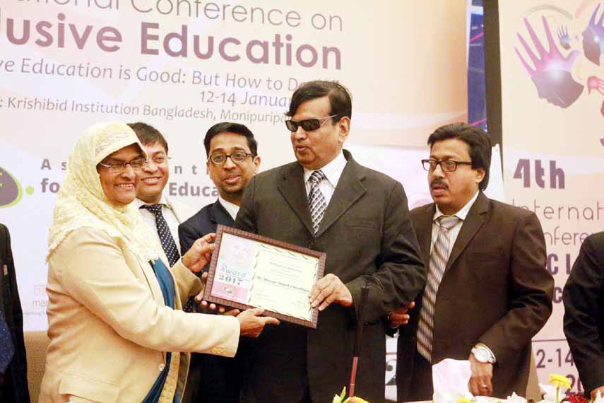Prof Husne Ara Begum, Director of IER, University of Dhaka is seen at the NAMI award ceremony with Monsur Ahmed Chowdhury held at Krishibid Institute Bangladesh in the capital recently.
