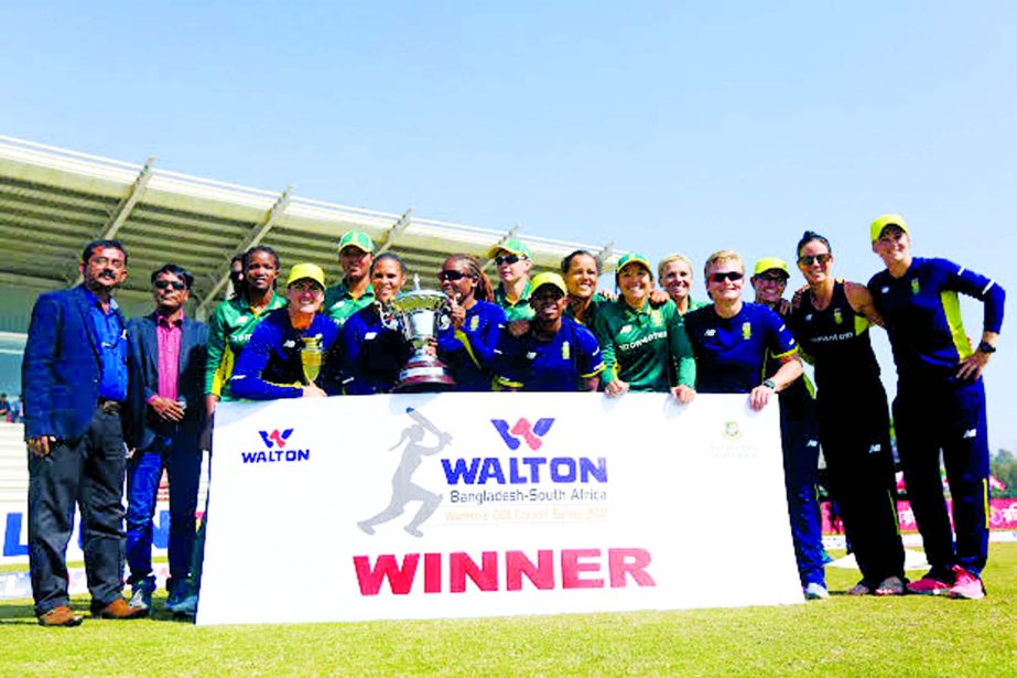 Members of South Africa Women's Cricket team pose with the officials of Walton Group after winning the ODI series 4-1 against their counterpart Bangladesh Women's Cricket team at the Sheikh Kamal International Cricket Stadium in Cox's Bazar on Friday.