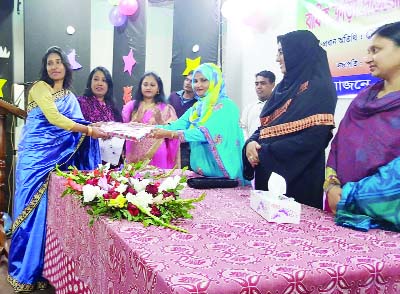 KUSHTIA: Shamsun Nahar Begum , President, Kushtia Ladies' Club distributing prizes among the winners of annual sport competition at Hall Room of the Club on Friday.