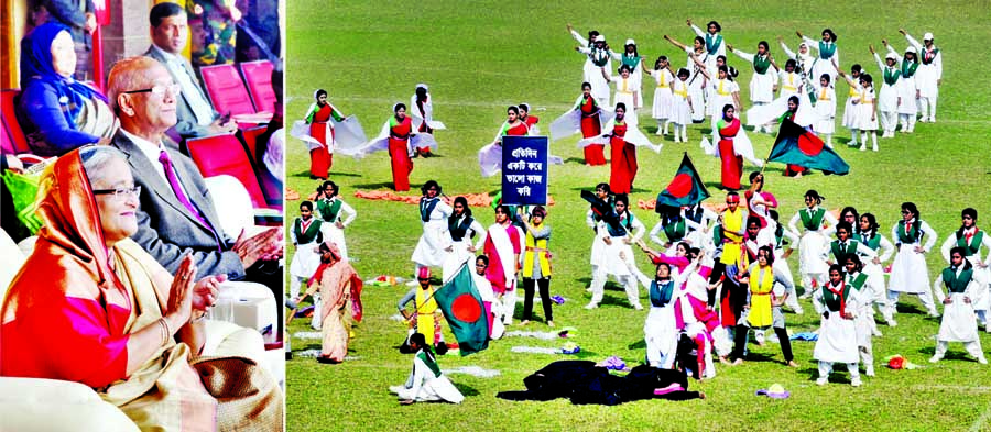 Prime Minister Sheikh Hasina enjoying display of the students at the concluding ceremony of the sports competition of different schools and madrashas of the country at the Bangabandhu National Stadium in the city on Sunday. BSS photo