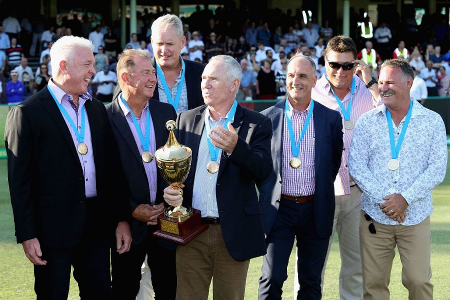 The 1987 Cricket World Cup winning squad pose for a photo after receiving their medals during game four of the One Day International series between Australia and Pakistan at Sydney Cricket Ground on Sunday.