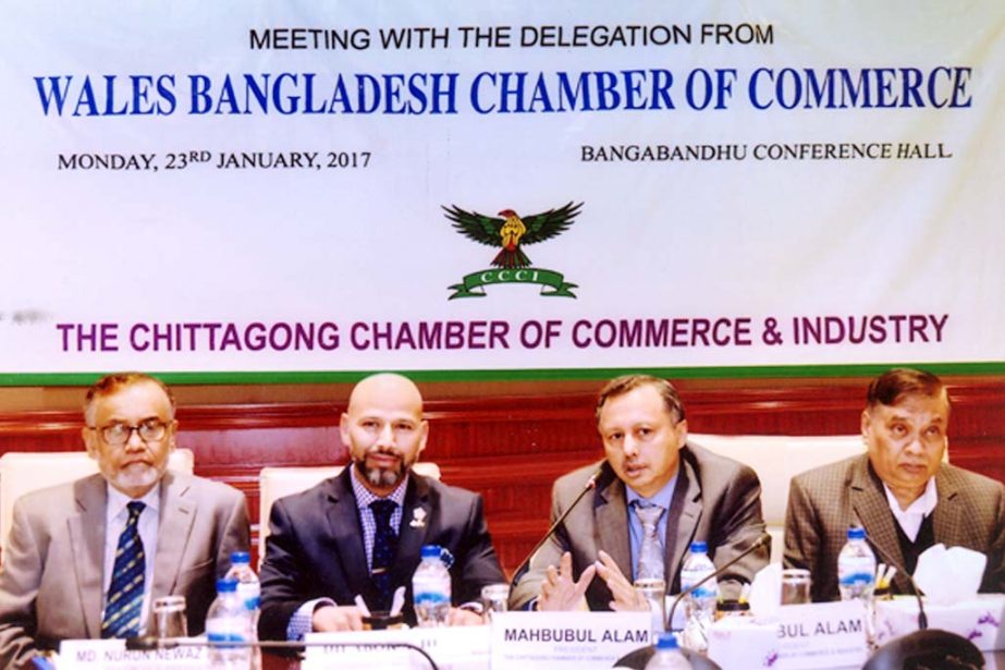 A delegation of Wales Bangladesh Chamber of Commerce and Industry exchange views with the leaders of Chittagong Chamber of Commerce and Industry yesterday.