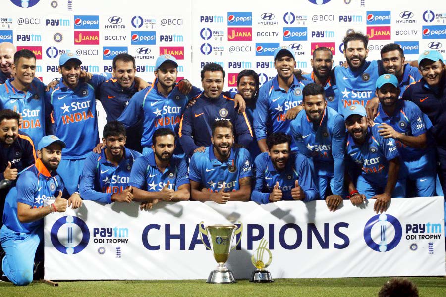India's ODI squad and support staffs celebrate a 2-1 series win against England in 3rd ODI at Kolkata on Sunday.