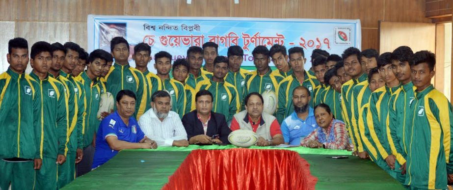 Rugby players and officials of Bangladesh Rugby Federation pose for photo after press conference, which was held on Tuesday at conference room of Bangabandu National Stadium.