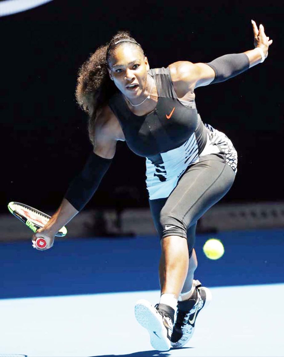 United States' Serena Williams makes a forehand return to Britain's Johanna Konta during their quarterfinal at the Australian Open tennis championships in Melbourne, Australia on Wednesday.