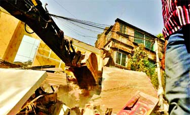 Dhaka North City Corporation conducted continuous drive for dismantling illegal structures in City's Sheorapara to Pirerbagh area on Wednesday.