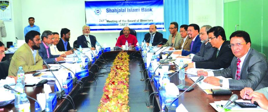 Engineer Md. Towhidur Rahman, Chairman, Board of Director Shahjalal Islami Bank Limited presided over its 243rd meeting at its head office in the city recently. Mohiuddin Ahmed and Md Harun Miah, Vice-Chairmen, Akkas Uddin Mollah, Md Sanaullah Shahid, Fak