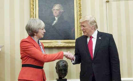 British Prime Minister Theresa May greeted by US President Donald Trump at the White House.