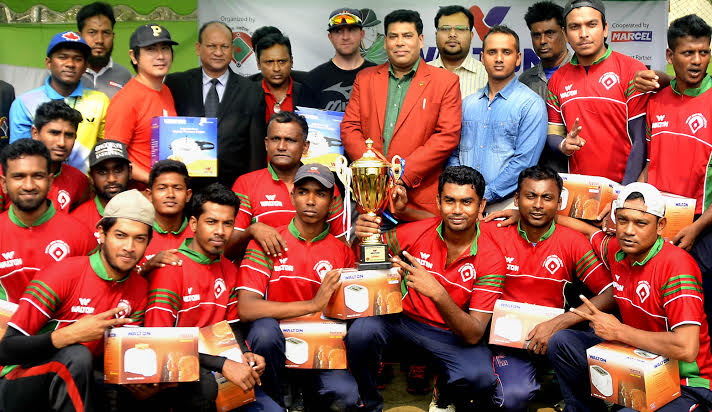 Bangladesh Police, the champions of the Walton 4th National Baseball Competition and the guests and officials of Bangladesh Baseball-Softball Association pose for photograph at the Paltan Maidan on Saturday. Police defeated Dhaka Commerce College by 14-3