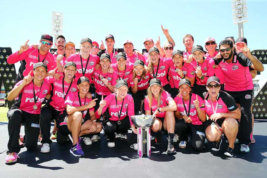 The Sydney Sixers team pose with the trophy after the final of the Women's Big Bash League between Perth Scorchers and Sydney Sixers at Perth on Saturday.