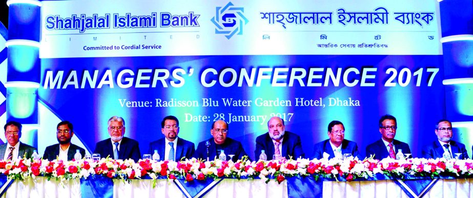 Engineer Md Towhidur Rahman, Chairman, Board of Directors of Shahjalal Islami Bank Limited presided over its "Managers' Conference-2017" held at a city hotel recently. Mohiuddin Ahmed and Md Harun Miah, Vice-Chairmen, Akkas Uddin Mollah, Md. Sanaullah