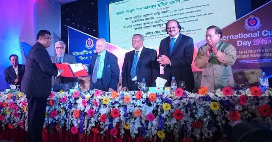 Chairman of Chittagong Port Authority Rear Admiral M. Khaled Iqbal receiving certificate of merit from World Customs Organisation for the outstanding performance in Export and Import through Chittagong Port recently.