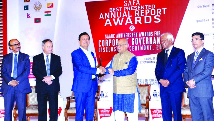 Muhammed Ali, Managing Director of United Commercial Bank Limited receiving the South Asian Federation of Accountants (SAFA) award for Joint First Runner up under the category of private sector banks for 'Best Presented Annual Reports 2015' from Finance