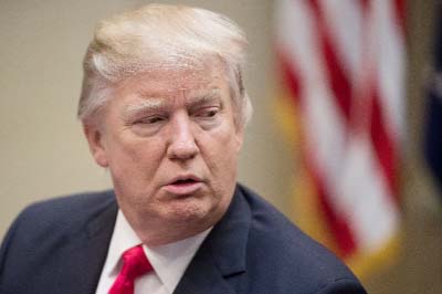 US President Donald Trump speaks in the Roosevelt Room at the White House on Monday.