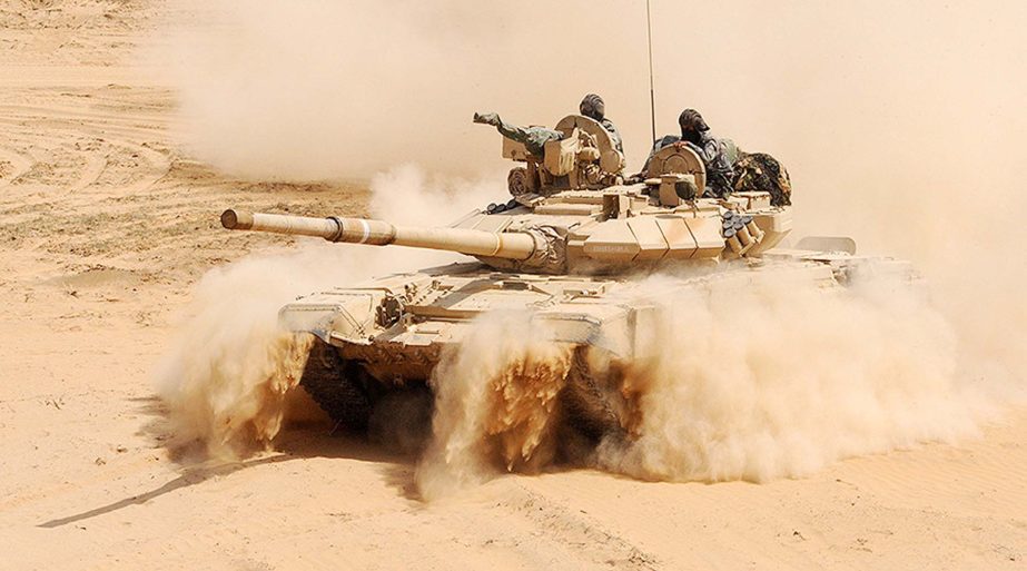 Photo shows an Indian Army T-90 battle tank patrolling in the border area.