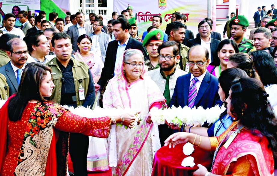 Prime Minister Sheikh Hasina on Wednesday inaugurating book stall of Amar Ekushey Boi Mela and International Literacy Conference 2017 cutting with ribon on the Bangla Academy premises.