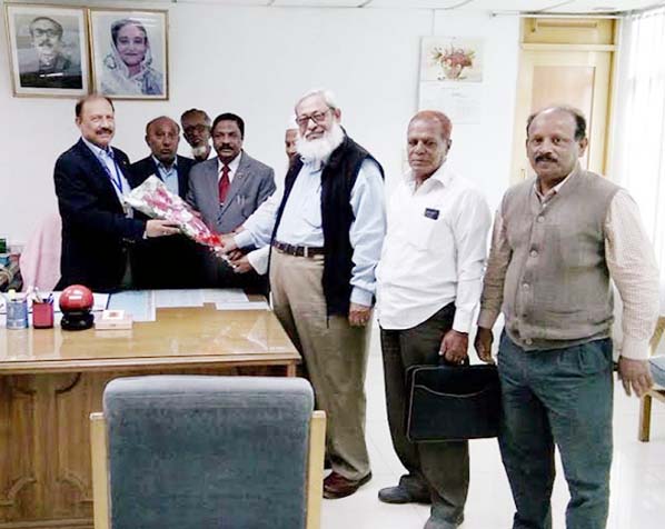 Superintendent Engineer of Chittagong WASA freedom fighter Md Sarwar congratulating WASA Managing Director Engineer AKM Fazlullah for extending services to him as freedom fighter for next two years at WASA Conference Room yesterday . They also attended