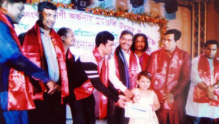 Md Abdur Rahim, General Secretary, Bangabandhu and Jatiya Char Neta Smriti Parishad distributing prizes among the winners of cultural function on the occasion of the Saraswati Puja organised by Probhati Sangho on Wednesday.