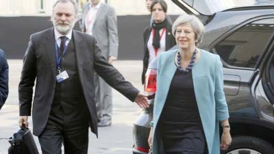 Theresa May arrives in Malta with Sir Tim Barrow, UK ambassador to the EU.