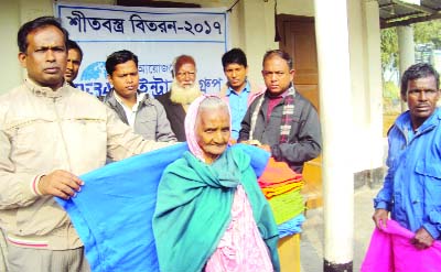 RANGPUR: UP Chairman Sohrab Ali Raju distributing winter clothes at Kolkanda Union under Gangachara Upazila in the district recently.