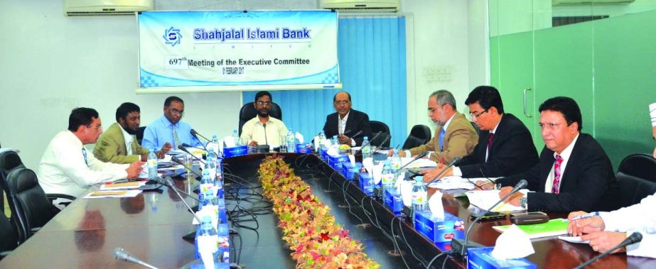 Md Sanaullah Shahid, Chairman, Executive Committee of Shahjalal Islami Bank Limited, presided over its 697th meeting at the banks head office in the city recently. Engineer Md. Towhidur Rahman, Chairman, Board of Directors, Anwer Hossain Khan, Khandoker S