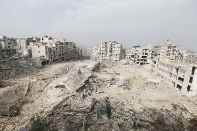 Mounds of rubble remain from what used to be high rise apartment buildings in the once rebel-held Ansari neighborhood of eastern Aleppo, Syria.