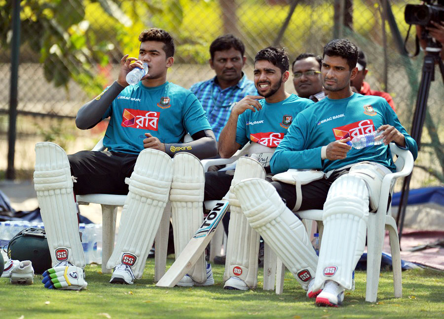 Bangladesh's Taskin Ahmed (L), Mominul Haque(C) and Mahmudullah watch a practice session at the Rajiv Gandhi International Cricket Stadium in Hyderabad on Saturday ahead of a Test match between India and Bangladesh.India will play one Test match against