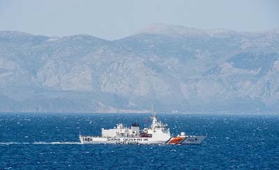 A Turkish coast guard ship patrols on the Aegean Sea, off the Turkish coast