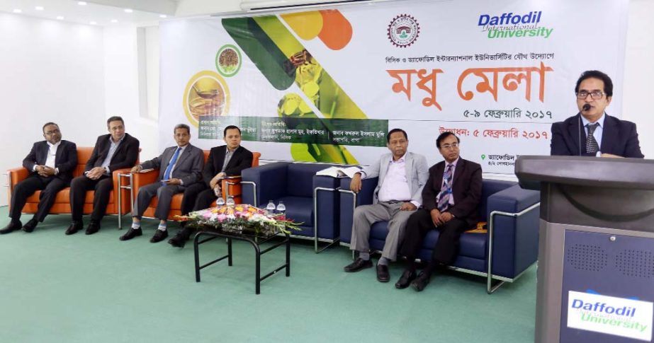 Mohammad Mosharrof Hossain Bhuiyan, Secretary, Ministry of Industries addressing the inaugural ceremony of a 5-day Honey Fair at Daffodil International University on Sunday.