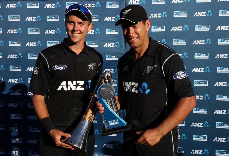 Trent Boult and Ross Taylor of New Zealand celebrate after the one-day international cricket match between New Zealand and Australia at Seddon Park in Hamilton on Sunday.