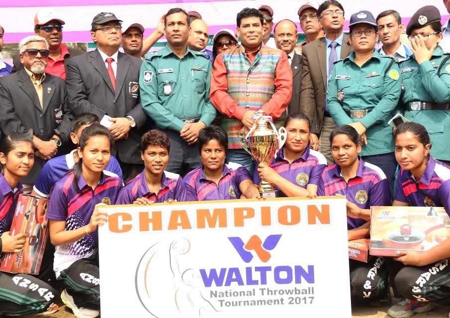 Bangladesh Ansar & VDP, the champions of the womenâ€™s division of the Walton 2nd National Throwball Tournament with the guests and officials of Bangladesh Throwball Association pose for photograph at the Paltan Maidan on Monday.