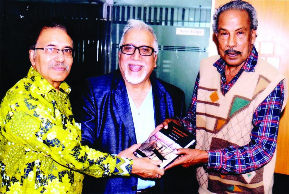 Pro-Vice Chancellor of Northern University Dr Anwarul Karim presenting his publication on â€œWater and Culture in Bangladesh" to Editor of The New Nation A M Mufazzal on Tuesday at News Room. Md Shahjahan Mojumder, News Editor was also present on the