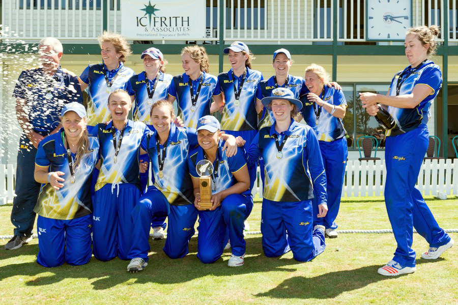 Champagne moment: The players of Otago Sparks celebrate after winning the Women's T20 final against Canterbury Magicians at Rangiora on Saturday.