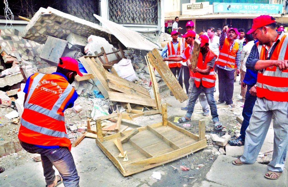 Dhaka South City Corporation conducting eviction drive to keep the hawker-free footpaths in city. This photo was taken from Dilkusha Commercial area on Sunday.