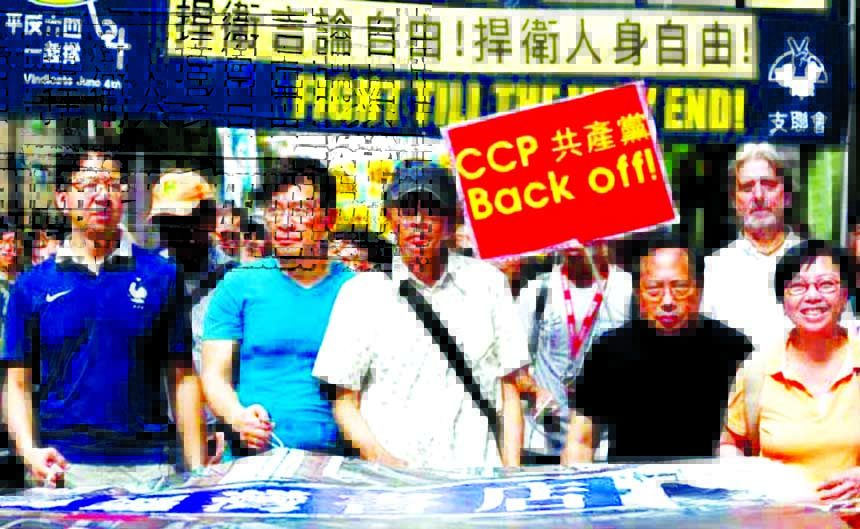 A protest march with pro-democracy lawmakers and supporters in Hong Kong.