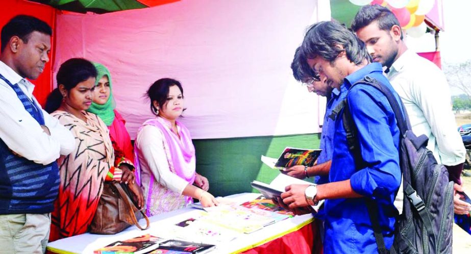 RANGPUR: Students of Begum Rokeya University visiting a Ekushey book stall at the four-daylong book fair being arranged on the campus on Sunday.