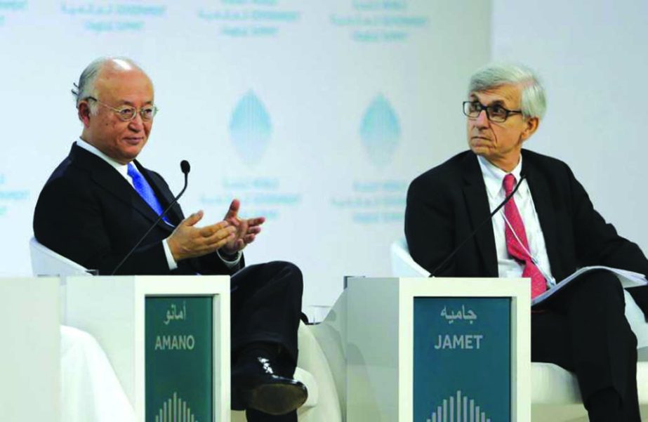 Director General of the International Atomic Energy Agency, IAEA, Yukiya Amano, left, talks next to Philippe Jamet, Commissioner of France Nuclear Safety Authority, ASN, during the last day of the World Government Summit, in Dubai, United Arab Emirates, o