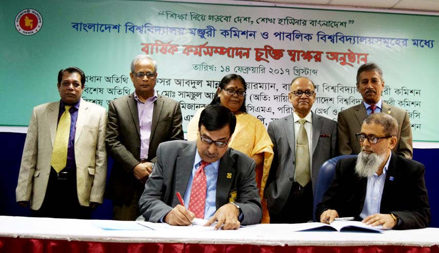 Prof Abdul Mannan, Chairman, UGC is seen witnessing a deal signing ceremony on annual performance with 37 universities held at UGC office in the city on Tuesday.