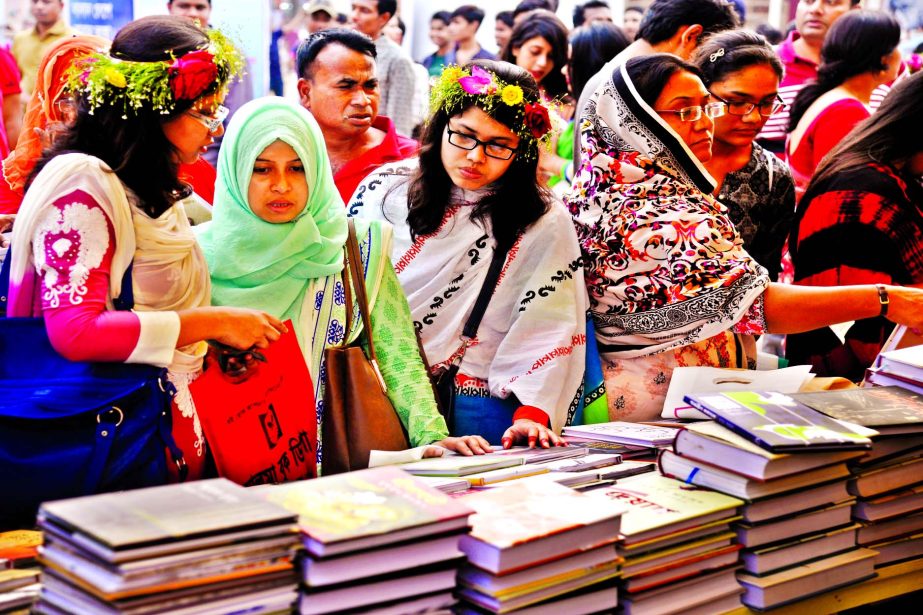 Book-lovers rush to the Amar Ekushey Boi Mela stalls on the occasion of Valentineâ€™s Day. This photo was taken from Bangla Academy premises on Tuesday.